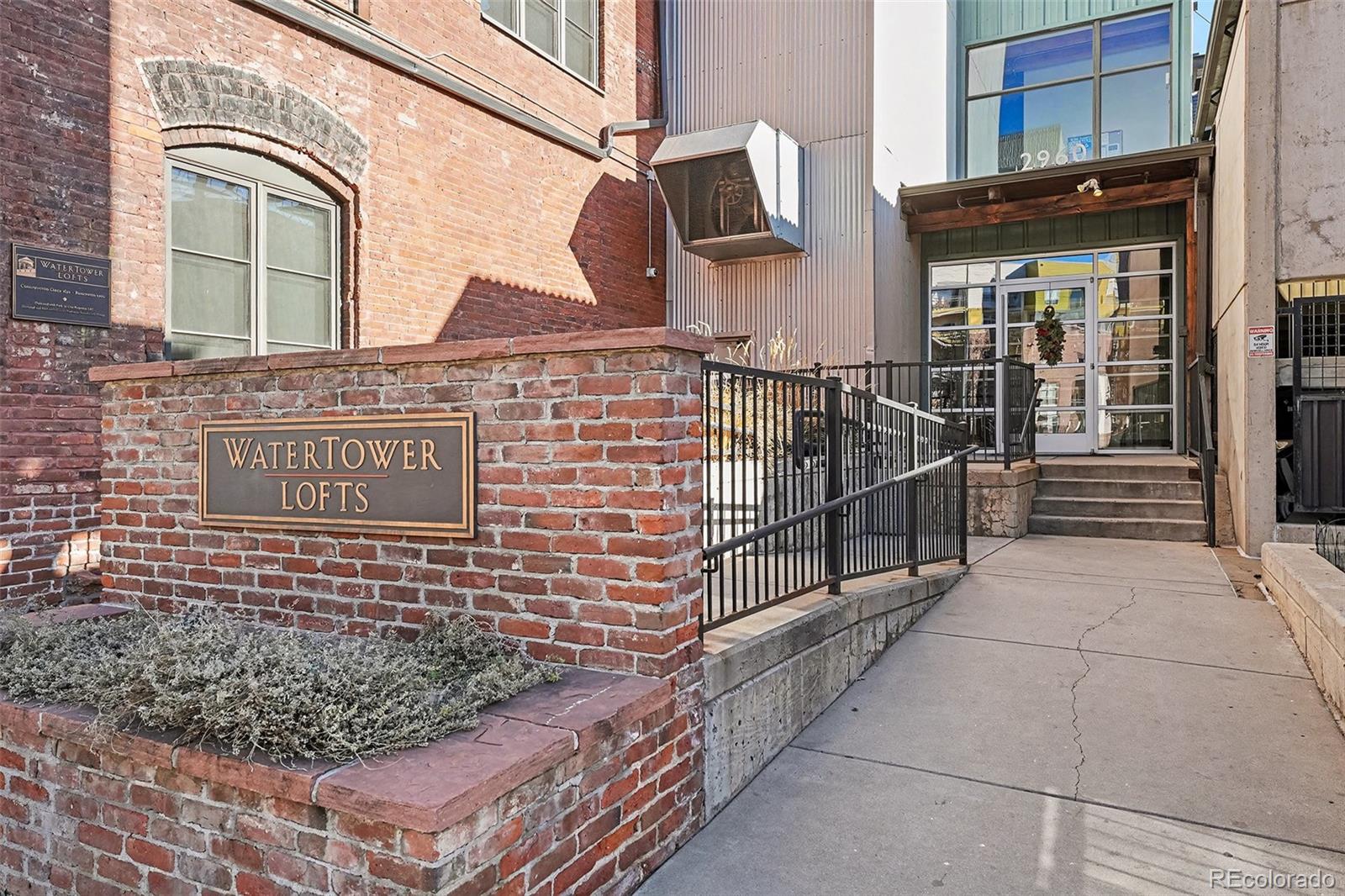 2960 Inca Street, Unit 103 Denver, CO 80202 - Photo 24 of 28 a view of entryway with brick walls