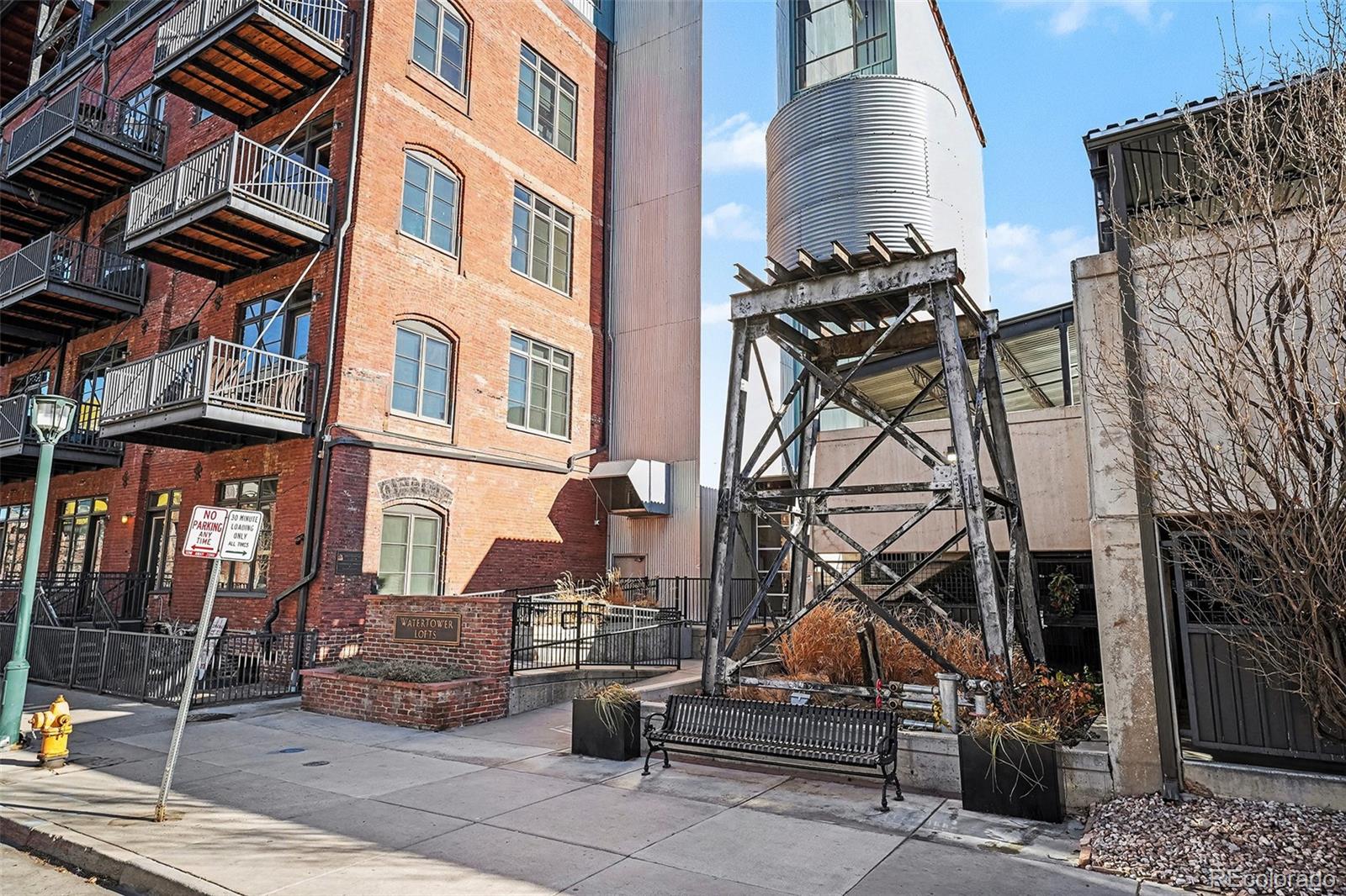 2960 Inca Street, Unit 103 Denver, CO 80202 - Photo 27 of 28 a view of a building with many windows