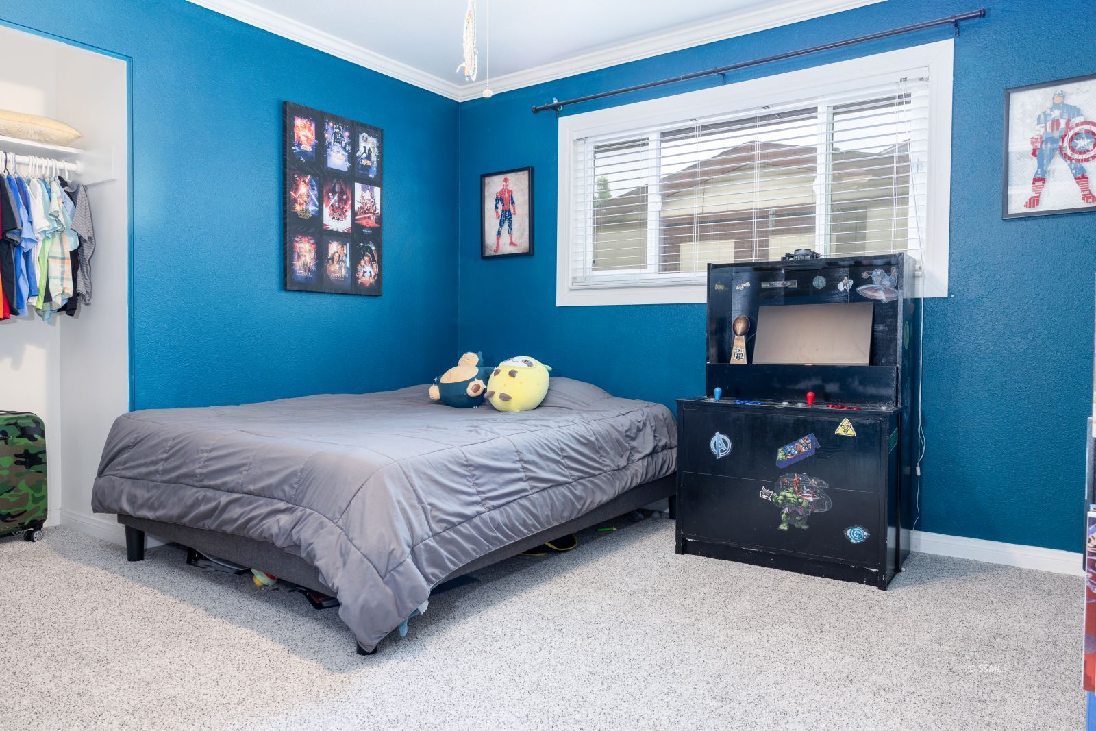640 Peg Street Ridgecrest, CA 93555 - Photo 14 of 25 a bedroom with a bed and a window