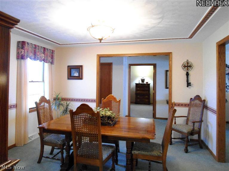 5761 Fenn Road Medina, OH 44256 - Photo 9 of 22 Note the patterned tray ceiling in the formal Dining Room.