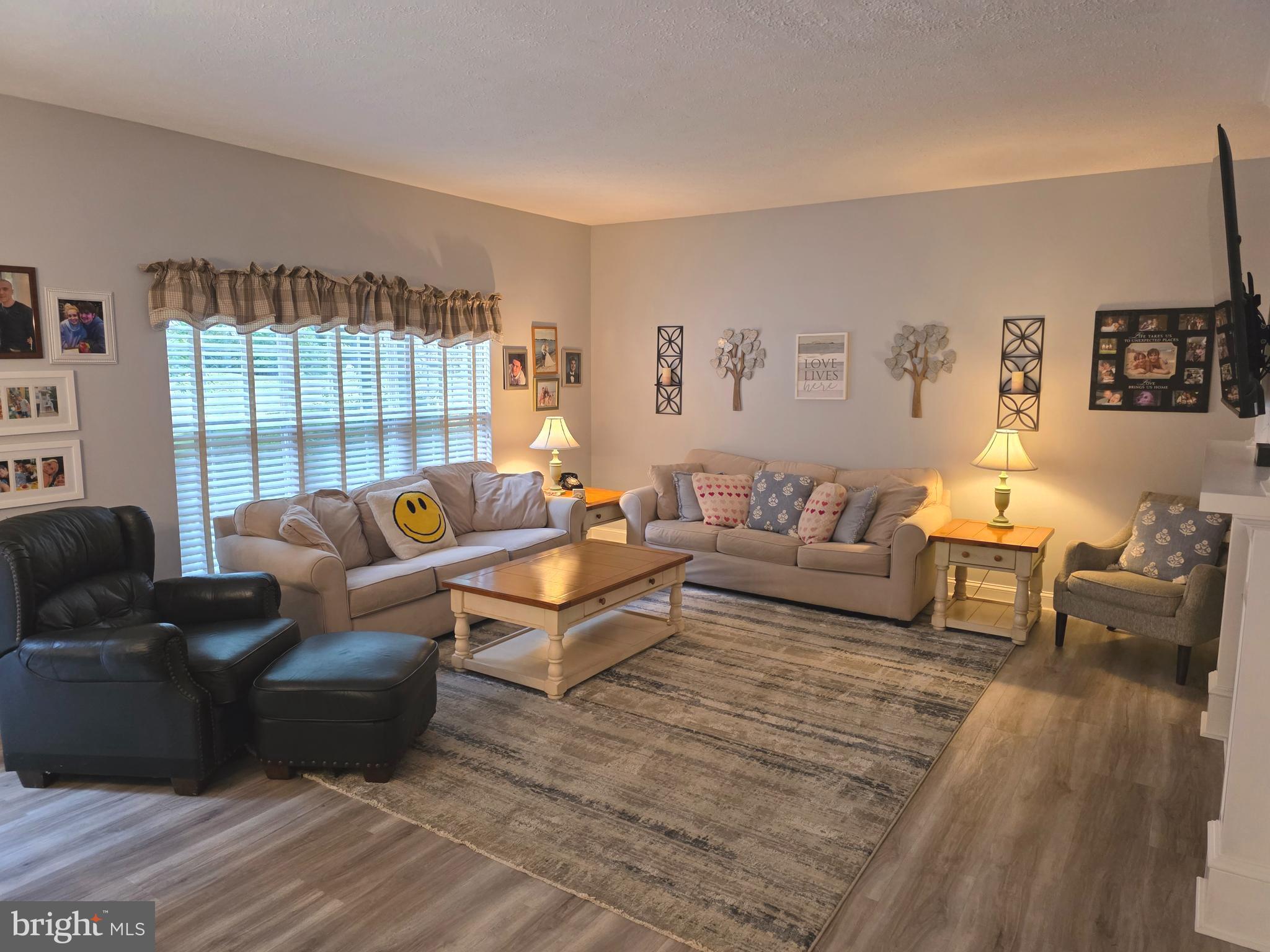 2441 Kemper Road Crofton, MD 21114 - Photo 27 of 63 a living room with furniture and a large window