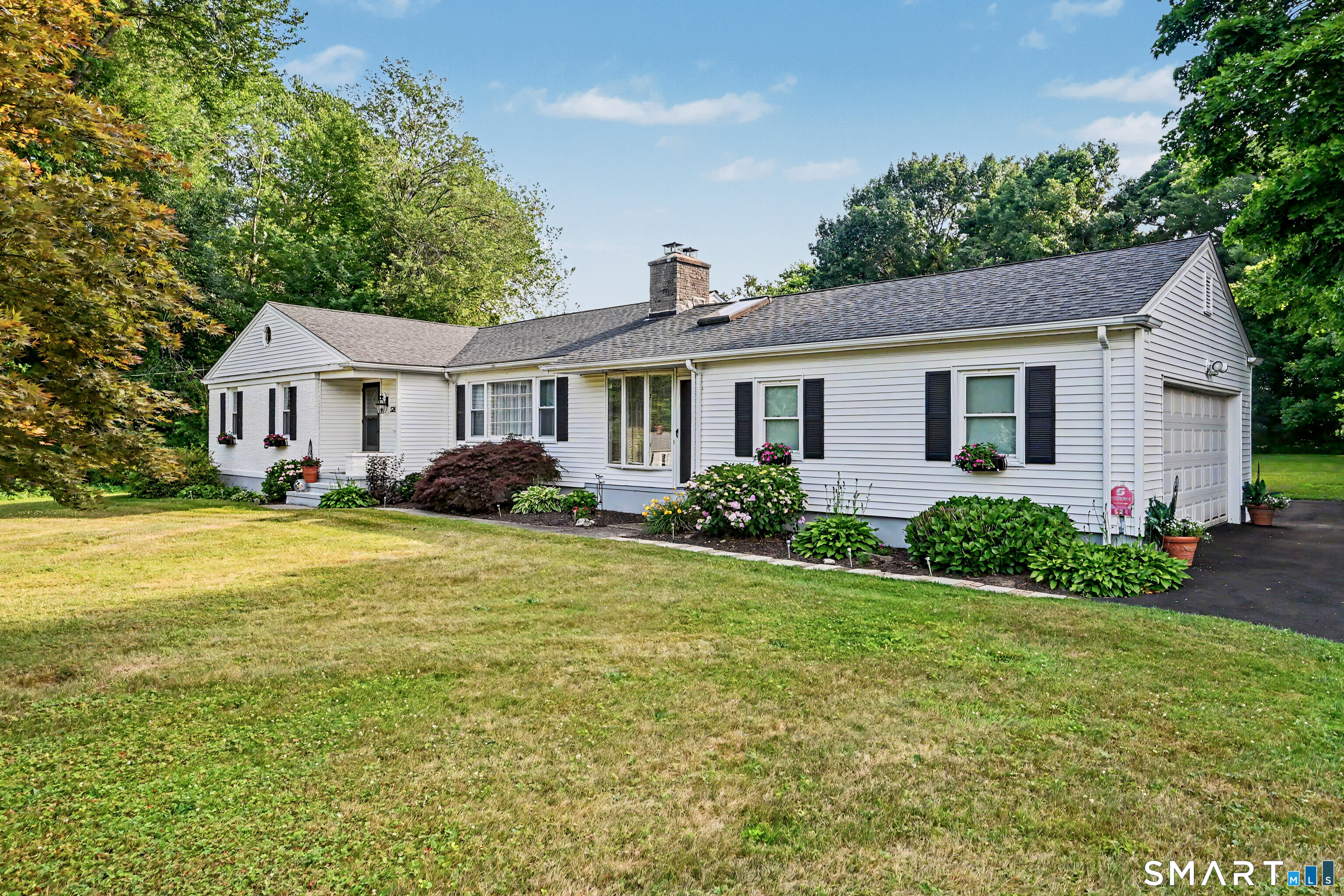 524 Ferry Road Orange, CT 06477 - Photo 40 of 40 a front view of house with yard and green space