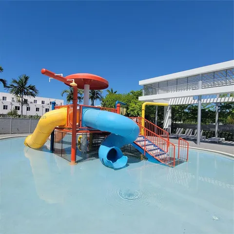 a view of a swimming pool with a patio