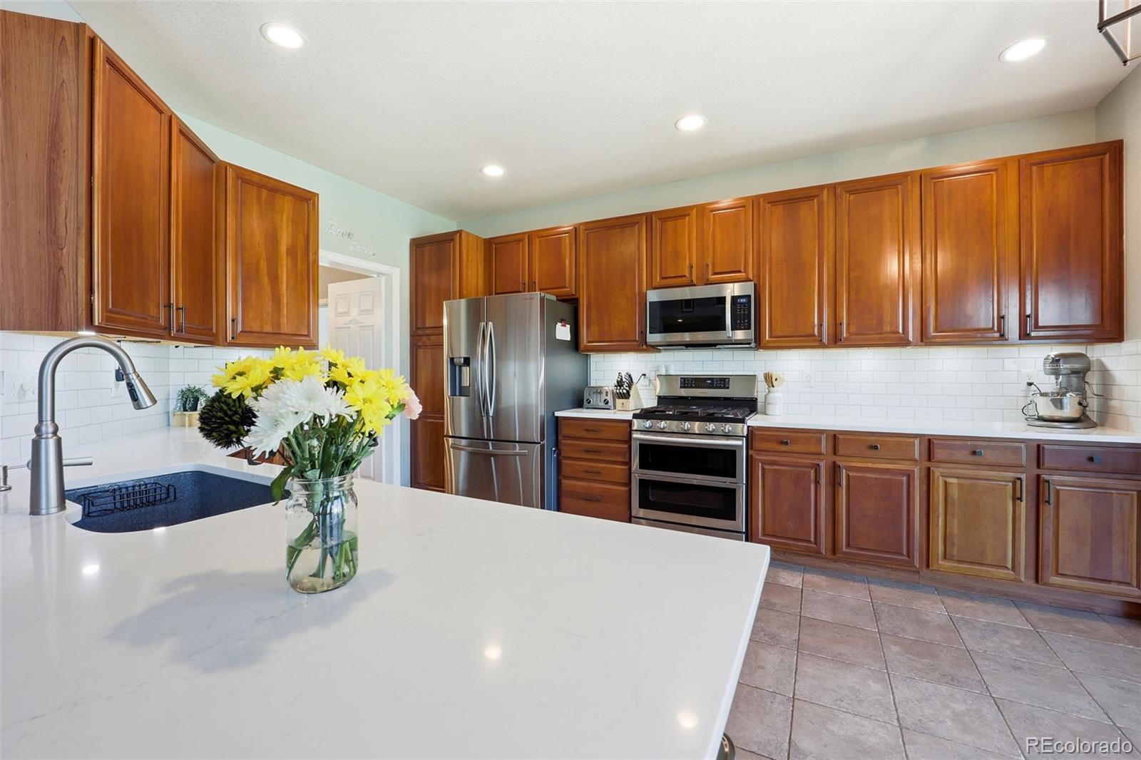 7703 Rampart Way Littleton, CO 80125 - Photo 9 of 49