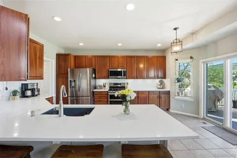 $950,000 | 7703 Rampart Way, Littleton, CO 80125