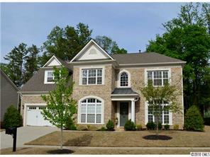 580 Quicksilver Trail Fort Mill, SC 29708 - Photo 1 of 16 a front view of a house with a yard