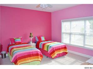 580 Quicksilver Trail Fort Mill, SC 29708 - Photo 14 of 16 a bedroom with two beds and a window