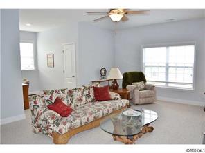 580 Quicksilver Trail Fort Mill, SC 29708 - Photo 15 of 16 a living room with furniture and a window