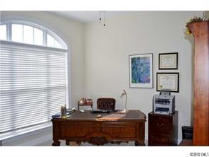 580 Quicksilver Trail Fort Mill, SC 29708 - Photo 4 of 16 a bedroom with a bed and a window