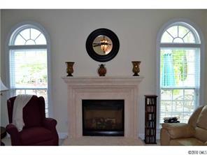 580 Quicksilver Trail Fort Mill, SC 29708 - Photo 9 of 16 a view of a livingroom with furniture and a fireplace