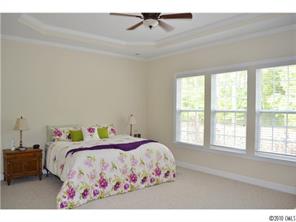 580 Quicksilver Trail Fort Mill, SC 29708 - Photo 10 of 16 a bedroom with a bed and a window