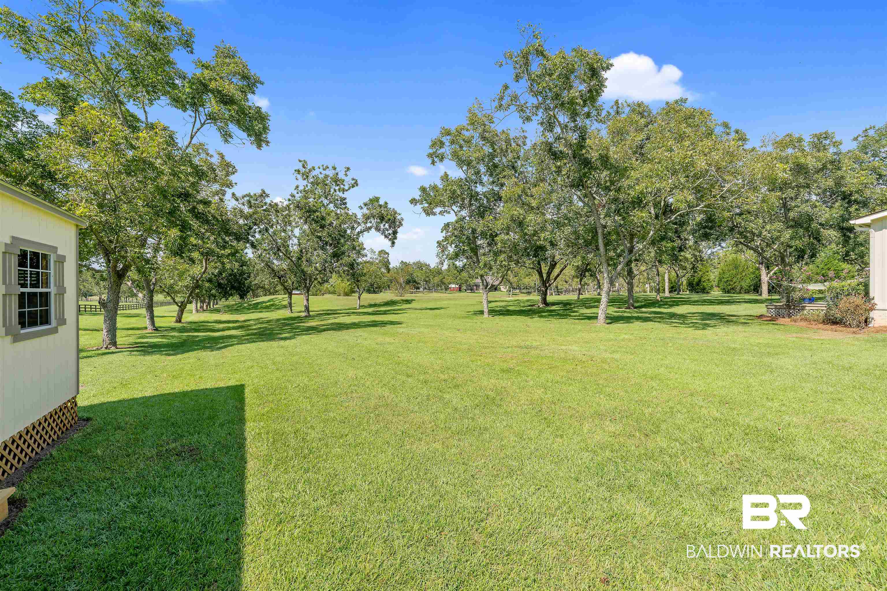 8753 Bishop Road Fairhope, AL 36532 - Photo 47 of 59 Expansive grassy area featuring scattered mature trees