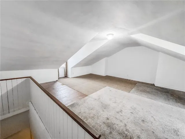 a view of entryway and kitchen