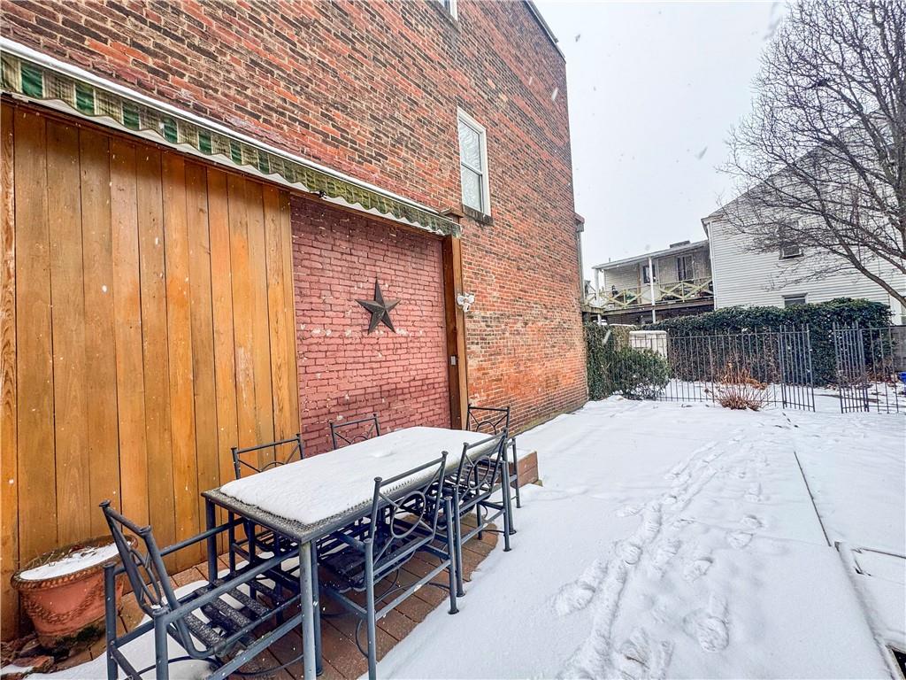 52 South 18th Street Pittsburgh, PA 15203 - Photo 25 of 26 a patio with table and chairs