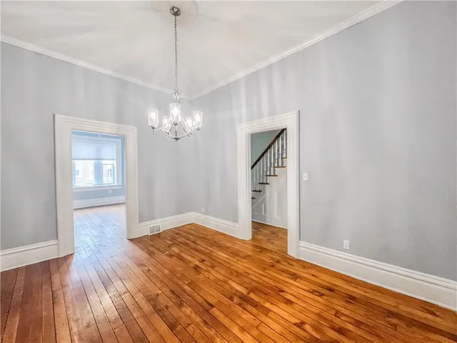 a view of a livingroom with wooden floor