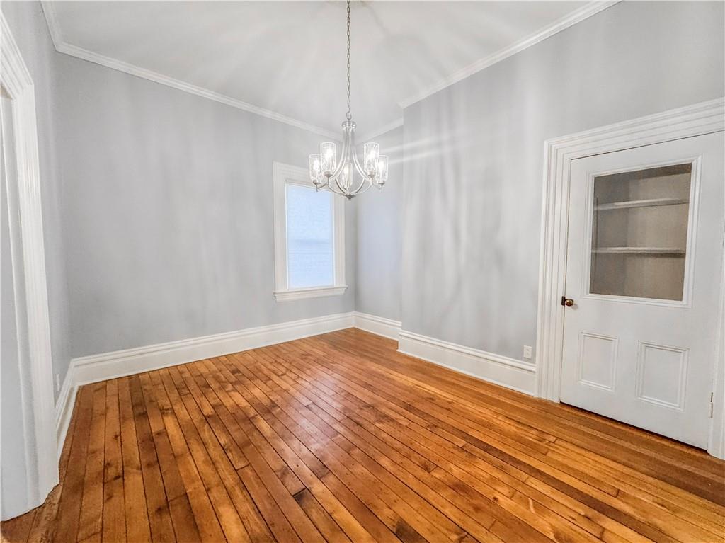 52 South 18th Street Pittsburgh, PA 15203 - Photo 9 of 26 a view of a room with wooden floor and white walls