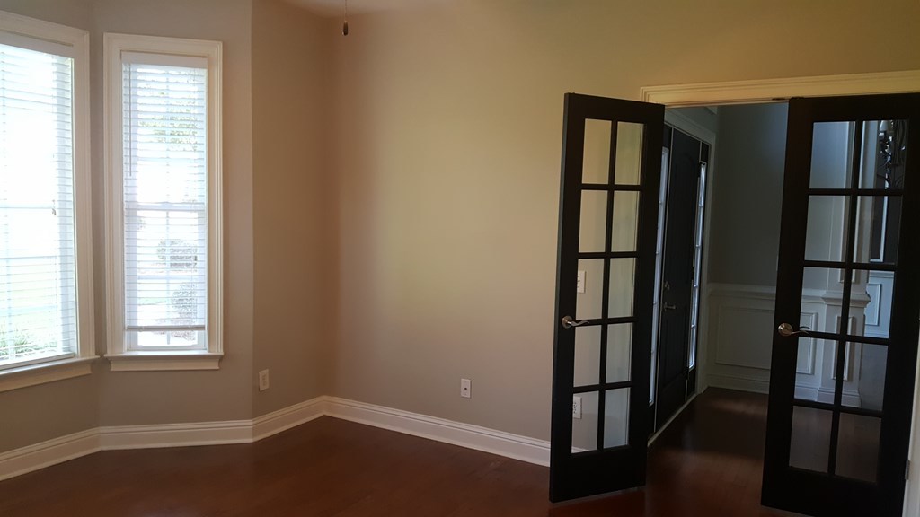 212 Will Way Byron, GA 31008 - Photo 14 of 27 wooden floor in an empty room