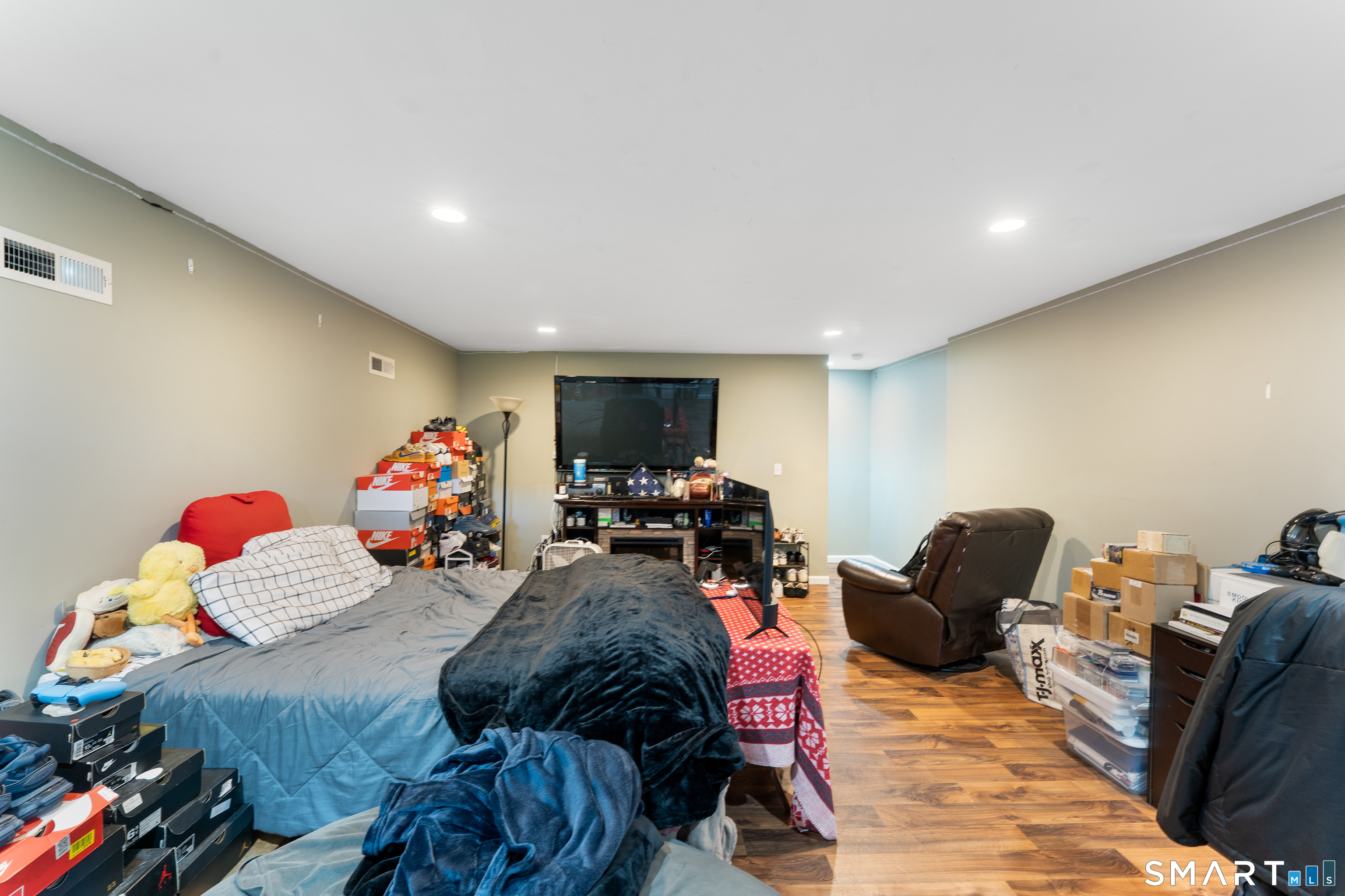 261 Spring Road North Haven, CT 06473 - Photo 39 of 39 a bed room with furniture and a window