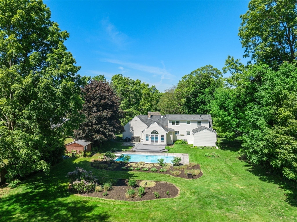 2035 Parker Street Springfield, MA 01128 - Photo 41 of 42 a aerial view of a house with a big yard plants and large trees
