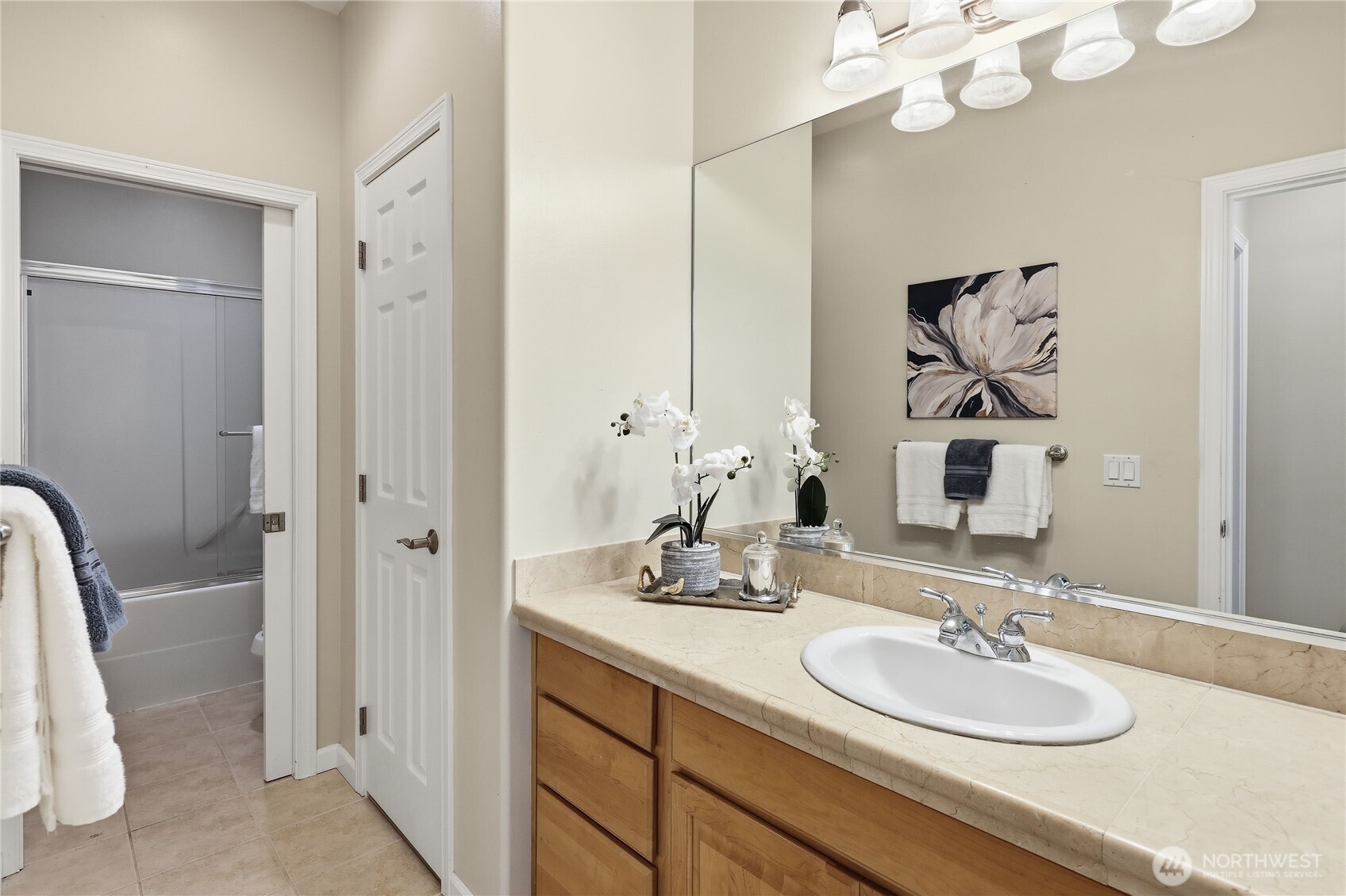 4354 Northwest Westgate Road Silverdale, WA 98383 - Photo 16 of 40 a bathroom with a double vanity sink and a mirror