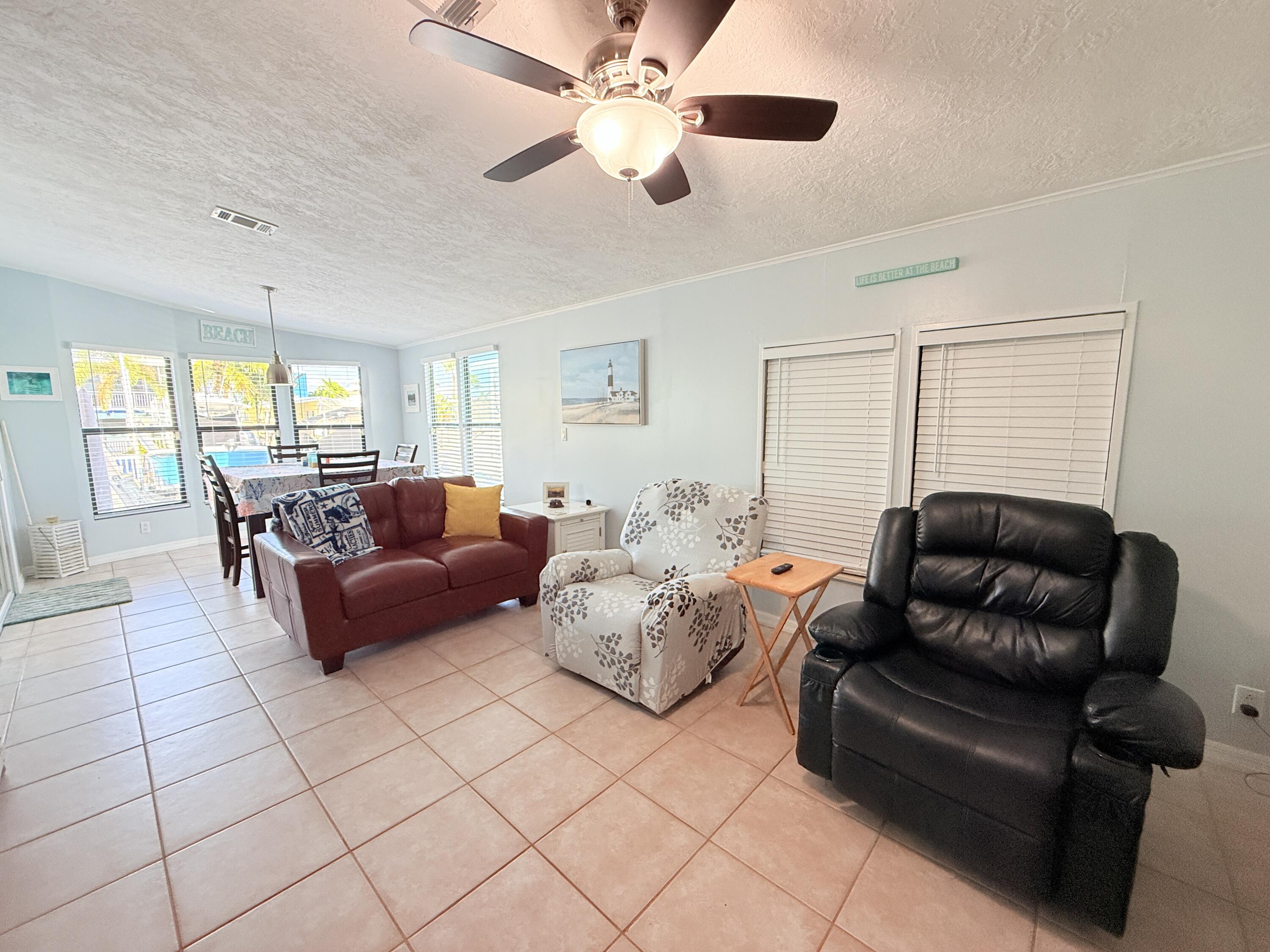 723 Boyd Drive Key Largo, FL 33037 - Photo 16 of 56 a living room with furniture