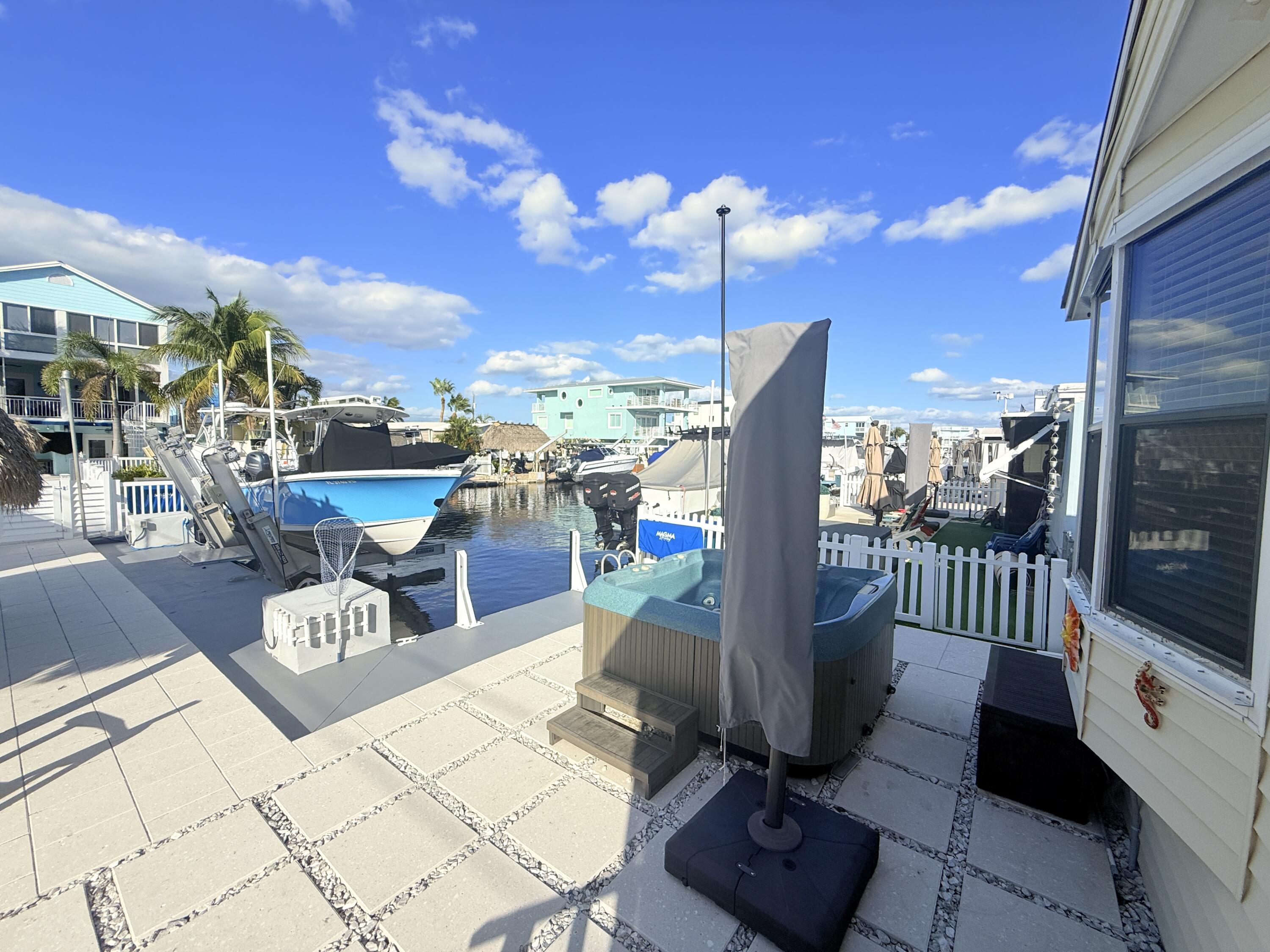 723 Boyd Drive Key Largo, FL 33037 - Photo 37 of 56 a view of a terrace with seating area