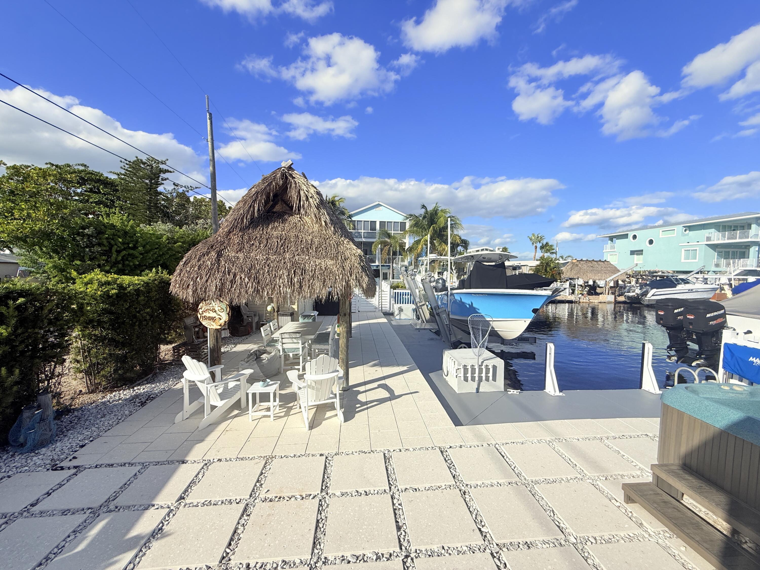 723 Boyd Drive Key Largo, FL 33037 - Photo 38 of 56 a view of a terrace with sitting area