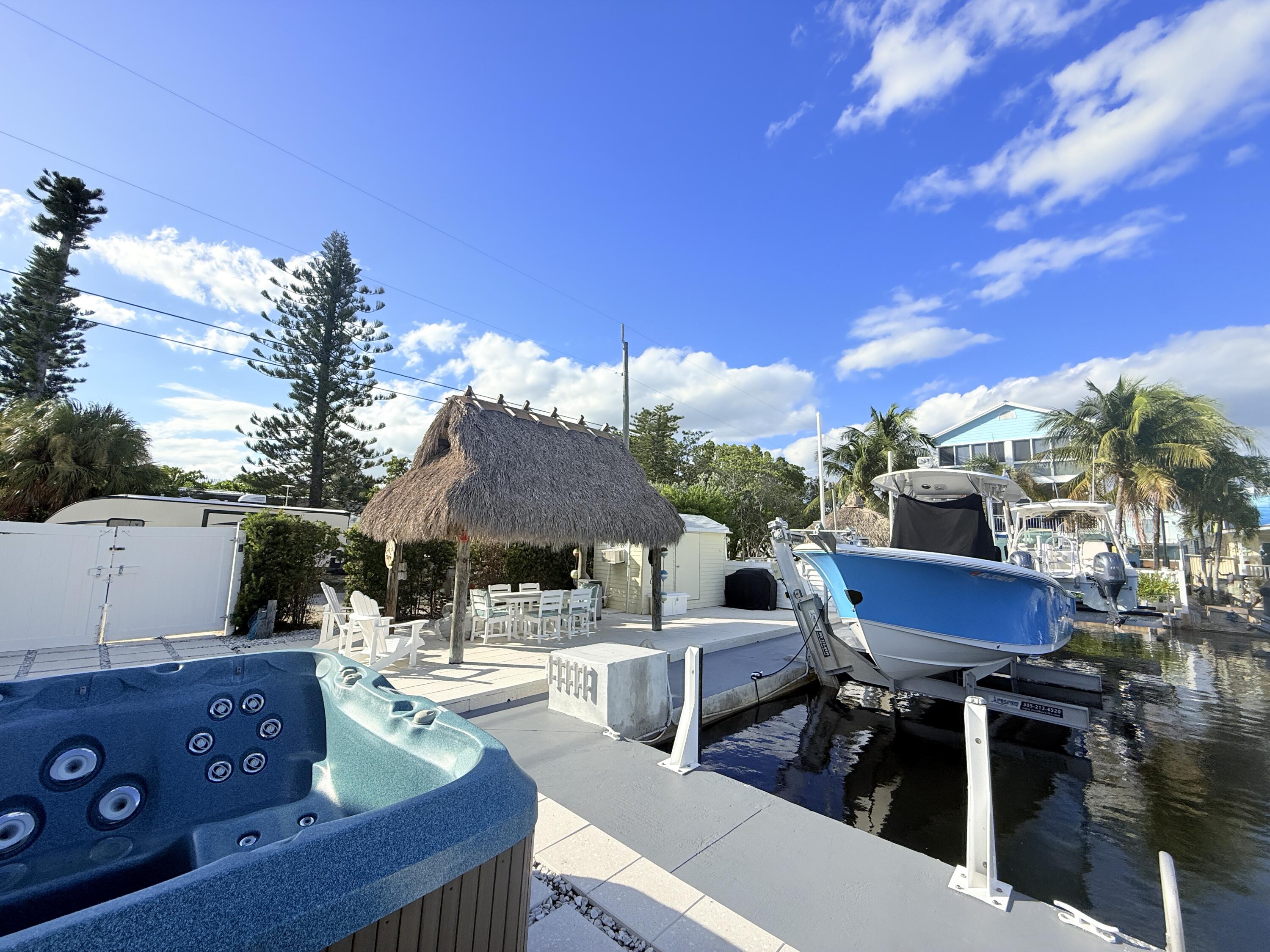 723 Boyd Drive Key Largo, FL 33037 - Photo 39 of 56 a outdoor space with lots of tables and chairs