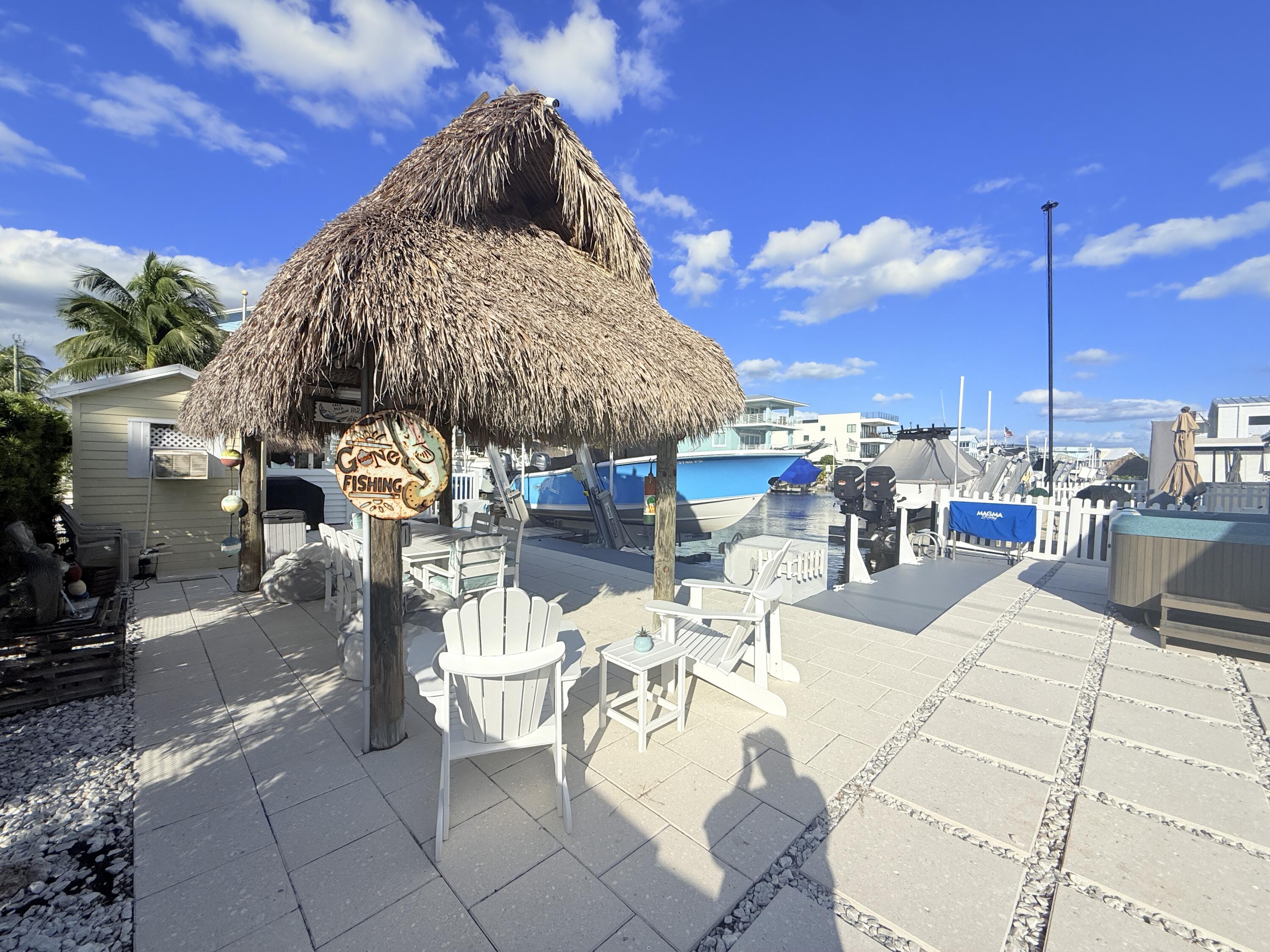723 Boyd Drive Key Largo, FL 33037 - Photo 41 of 56 a view of an outdoor space with seating