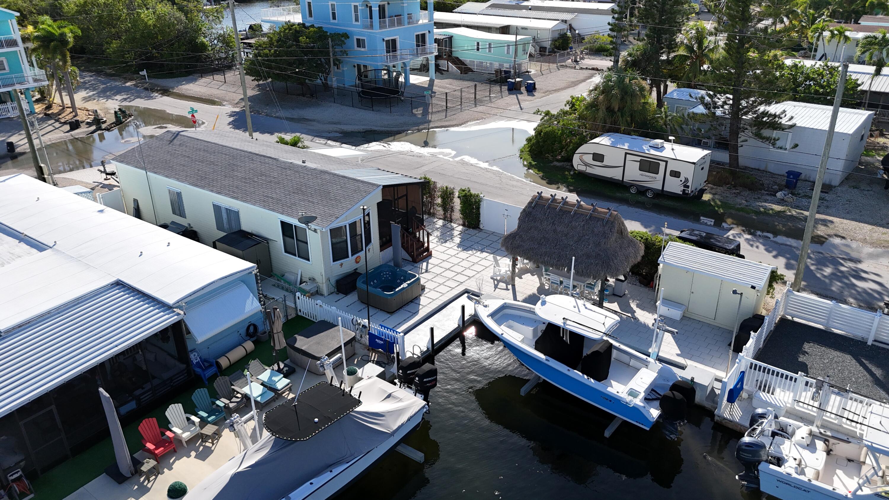 723 Boyd Drive Key Largo, FL 33037 - Photo 53 of 56 a roof deck view with couches and chairs