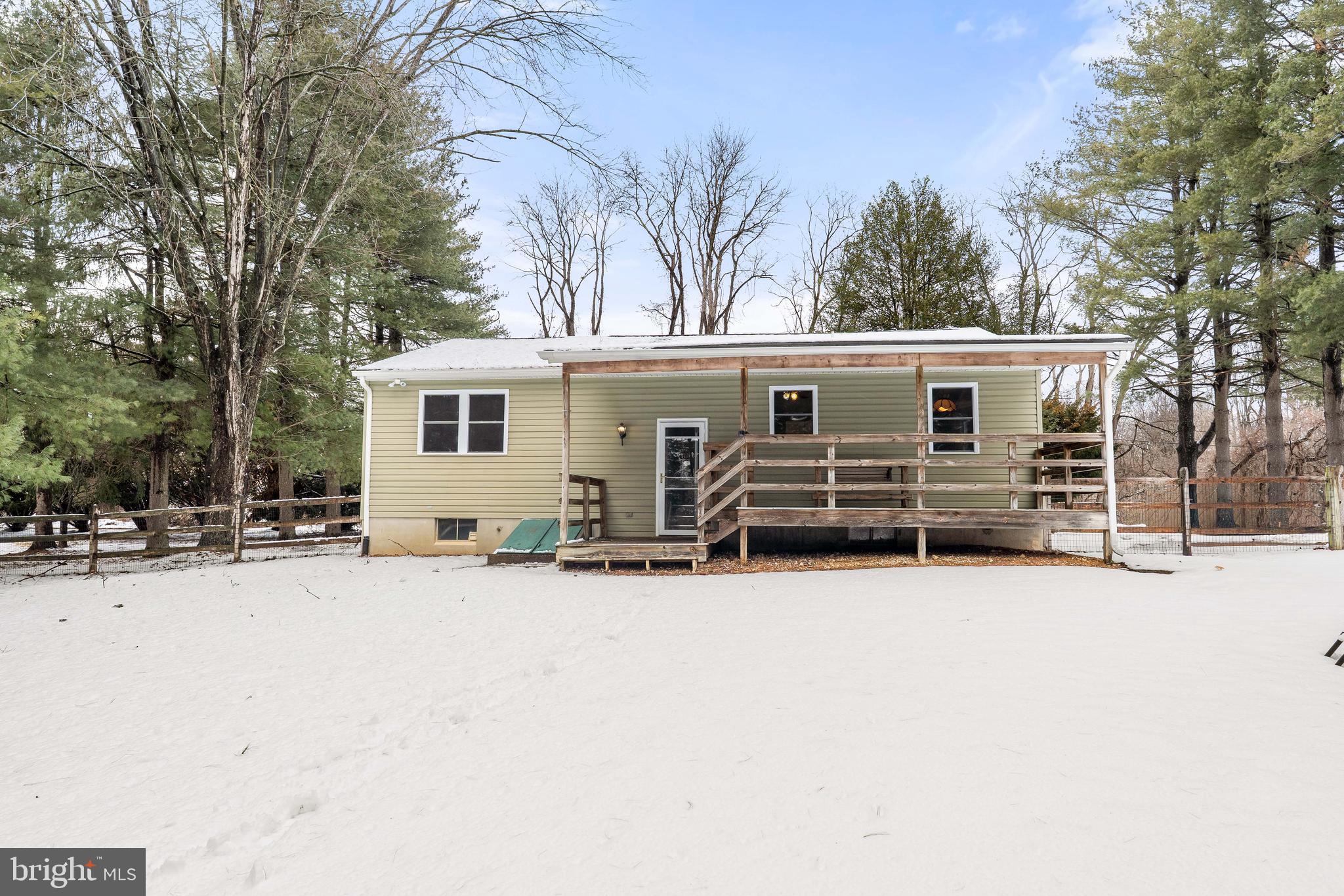 900 New Bridge Road Rising Sun, MD 21911 - Photo 23 of 29 a view of a house with a yard covered in snow