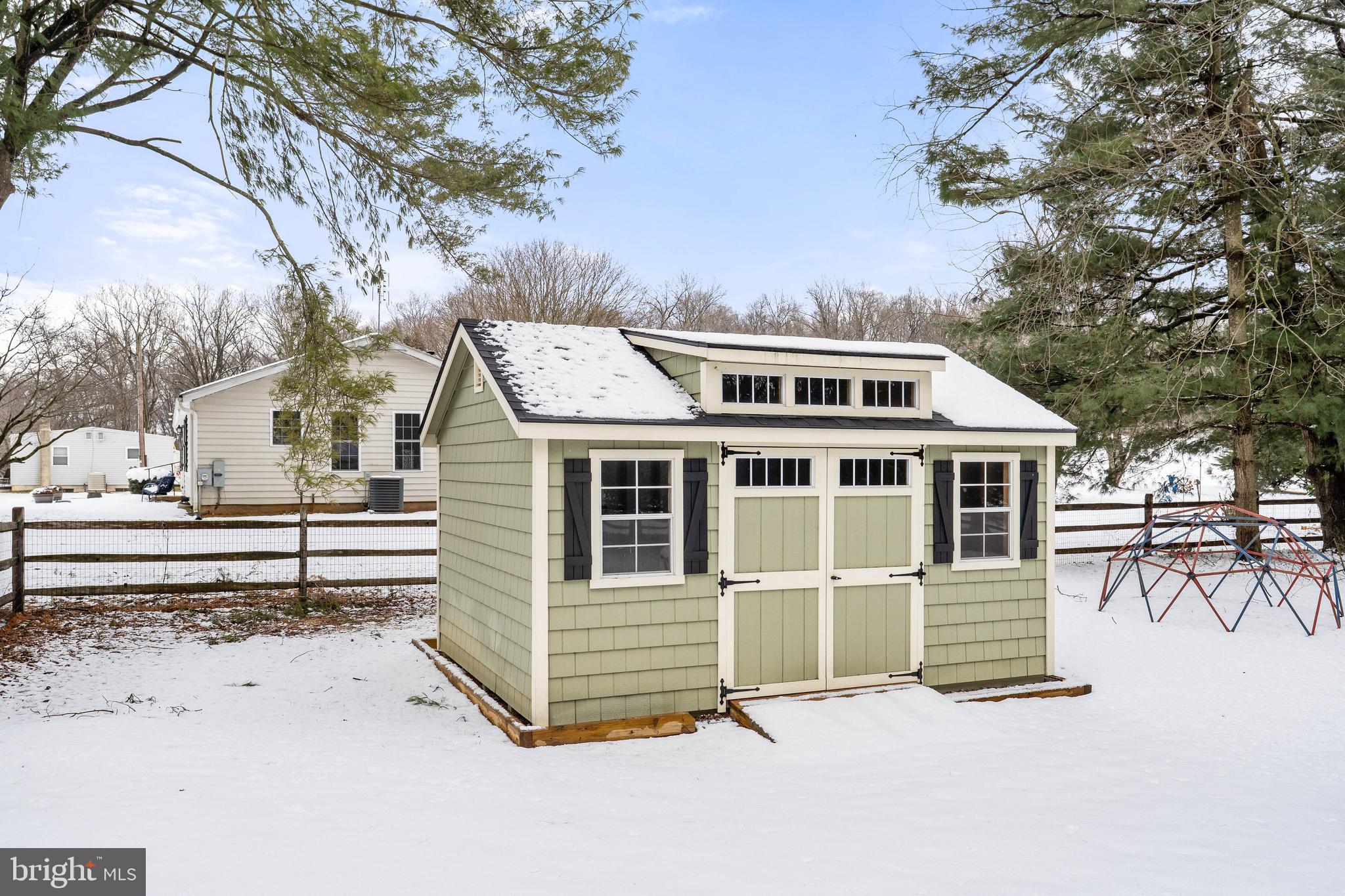 900 New Bridge Road Rising Sun, MD 21911 - Photo 26 of 29 a view of a house with a yard and wooden fence