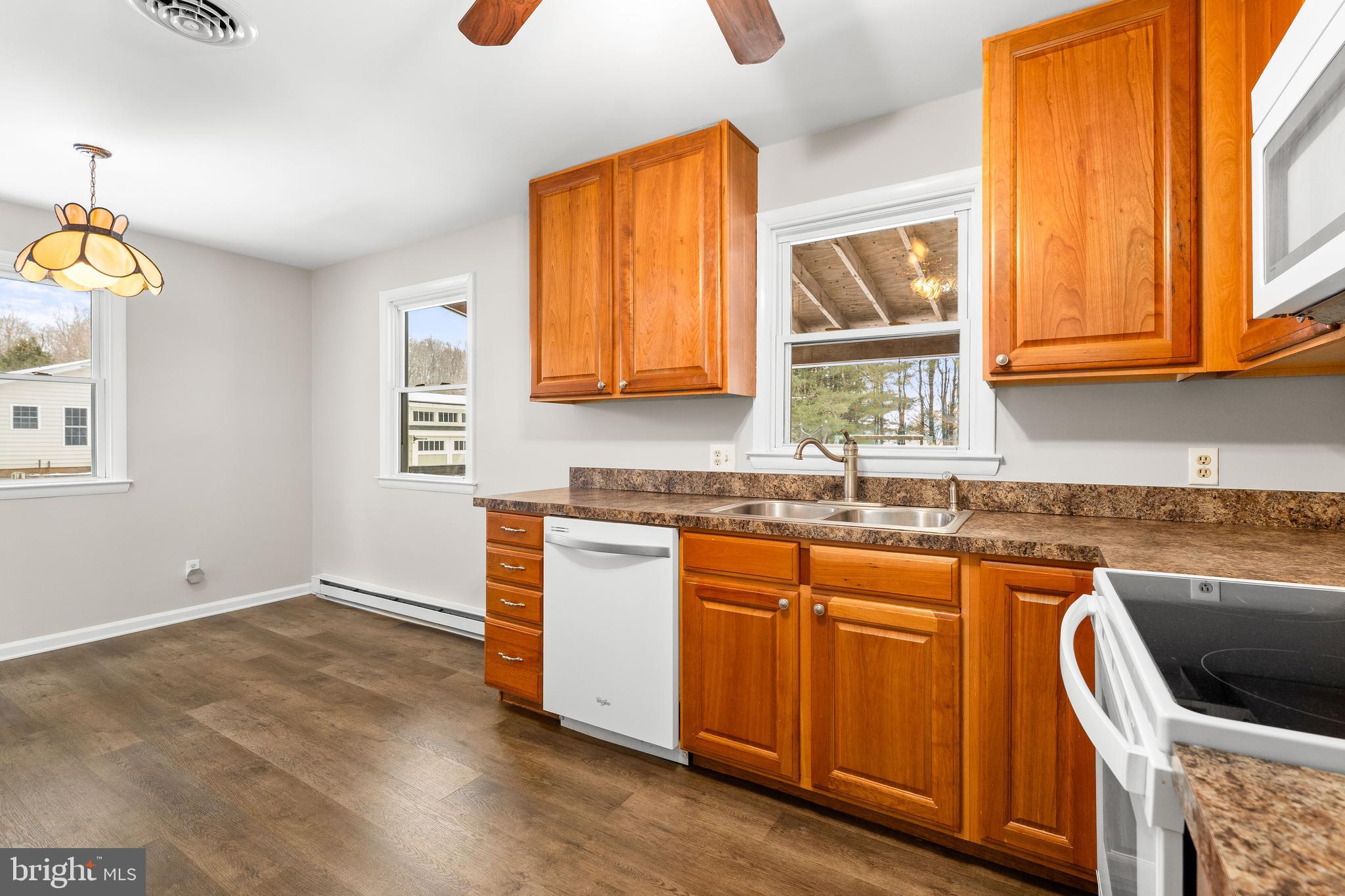 900 New Bridge Road Rising Sun, MD 21911 - Photo 9 of 29 a kitchen with granite countertop a sink and a window