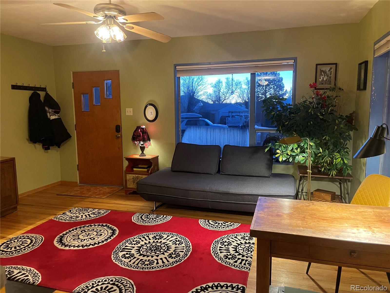 1328 I Street Salida, CO 81201 - Photo 14 of 24 a living room with furniture and a flat screen tv