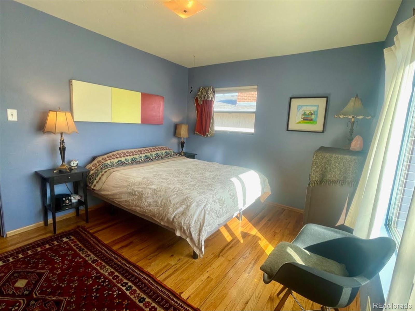1328 I Street Salida, CO 81201 - Photo 15 of 24 a bedroom with a bed and a lamp