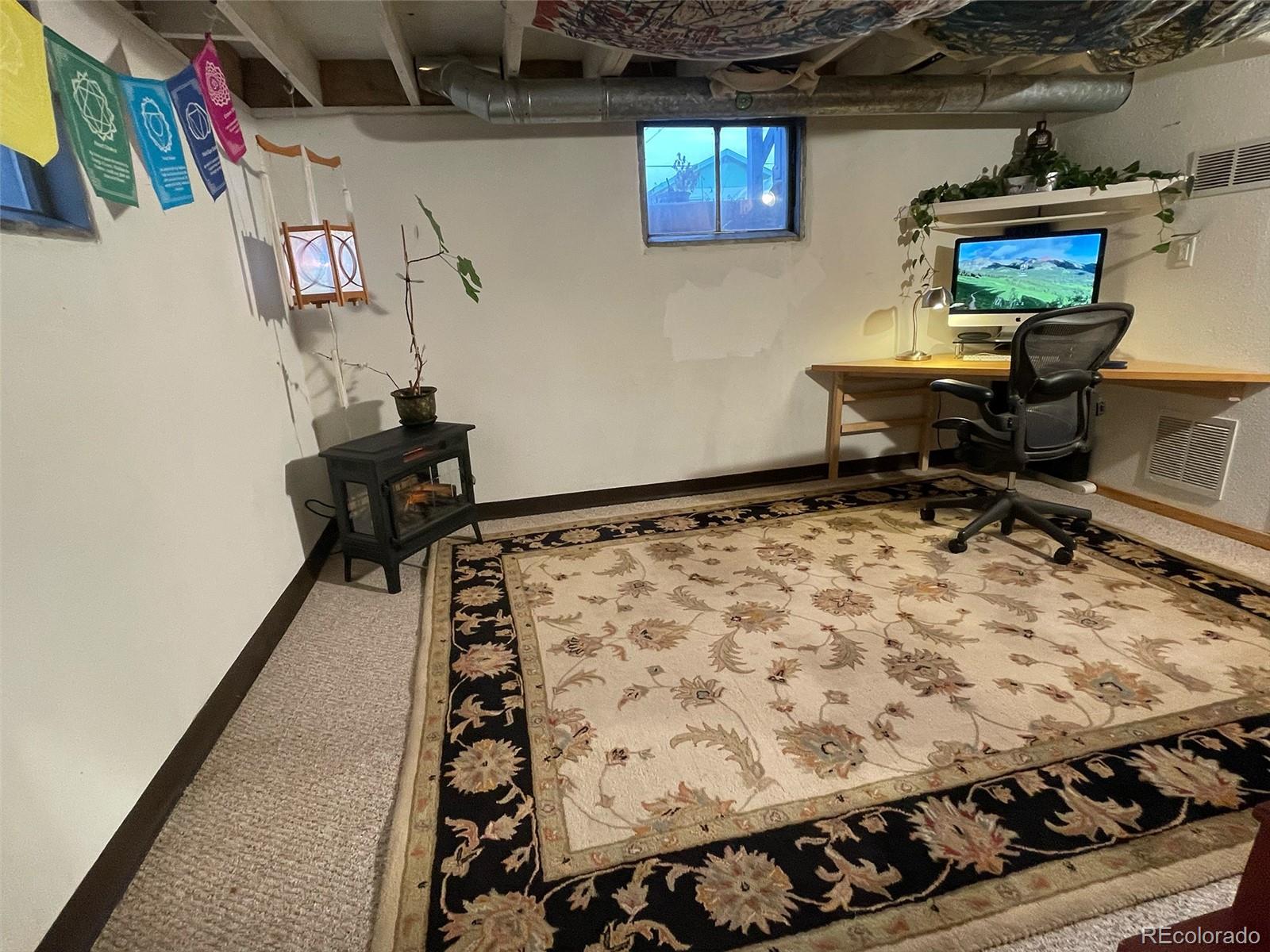 1328 I Street Salida, CO 81201 - Photo 19 of 23 a room with storage and utility