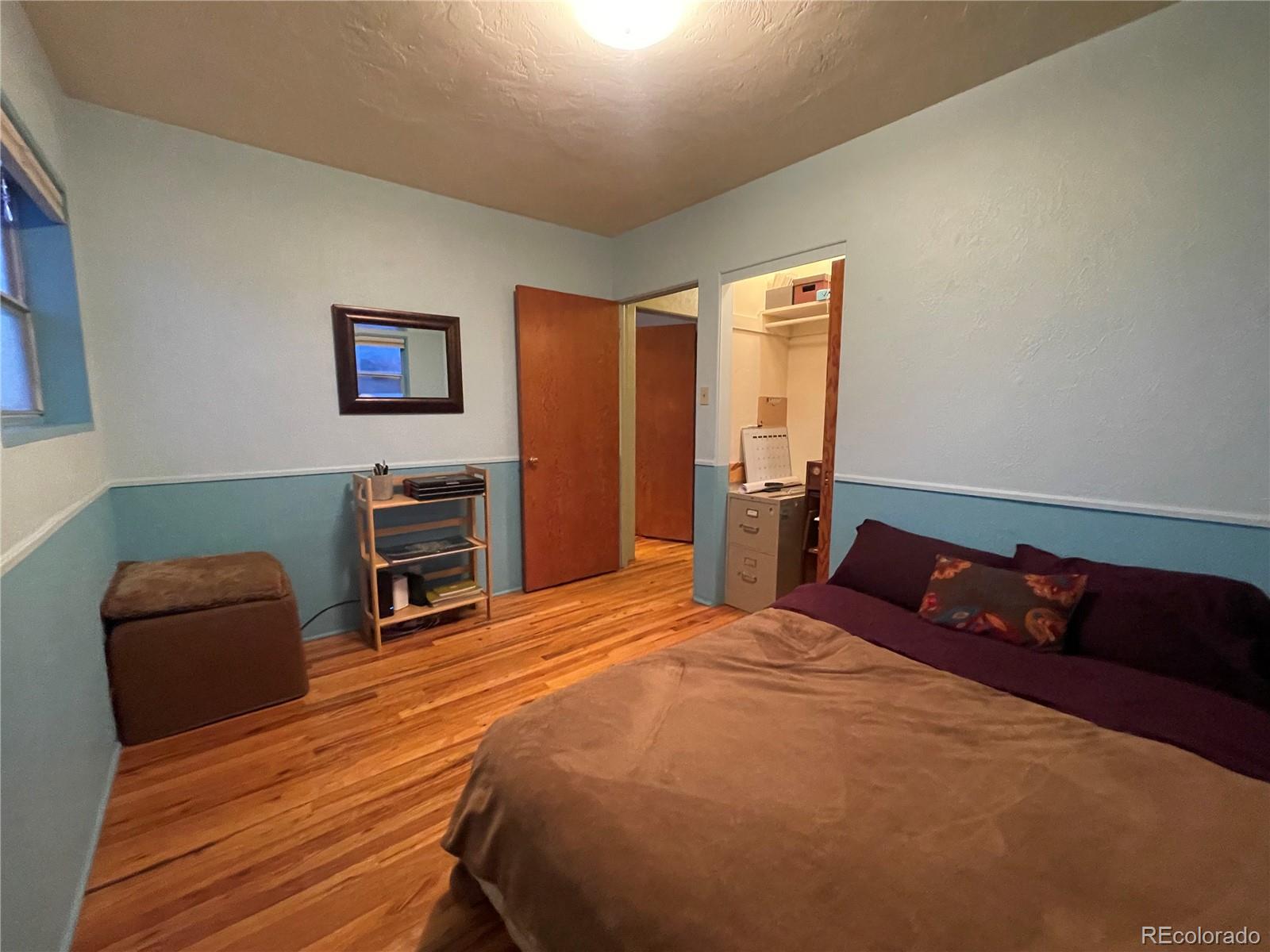 1328 I Street Salida, CO 81201 - Photo 19 of 24 a bedroom with a bed and a furniture
