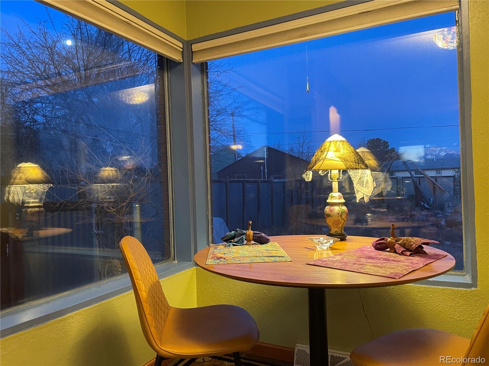 1328 I Street Salida, CO 81201 - Photo 3 of 24 a view of a dining room with furniture and wooden floor