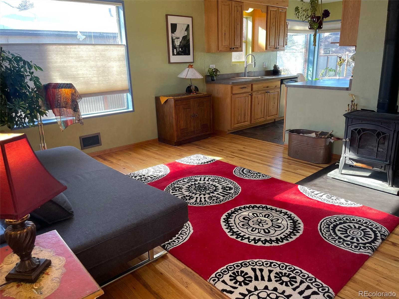 1328 I Street Salida, CO 81201 - Photo 5 of 24 a view of a room that has a couch and a table in it
