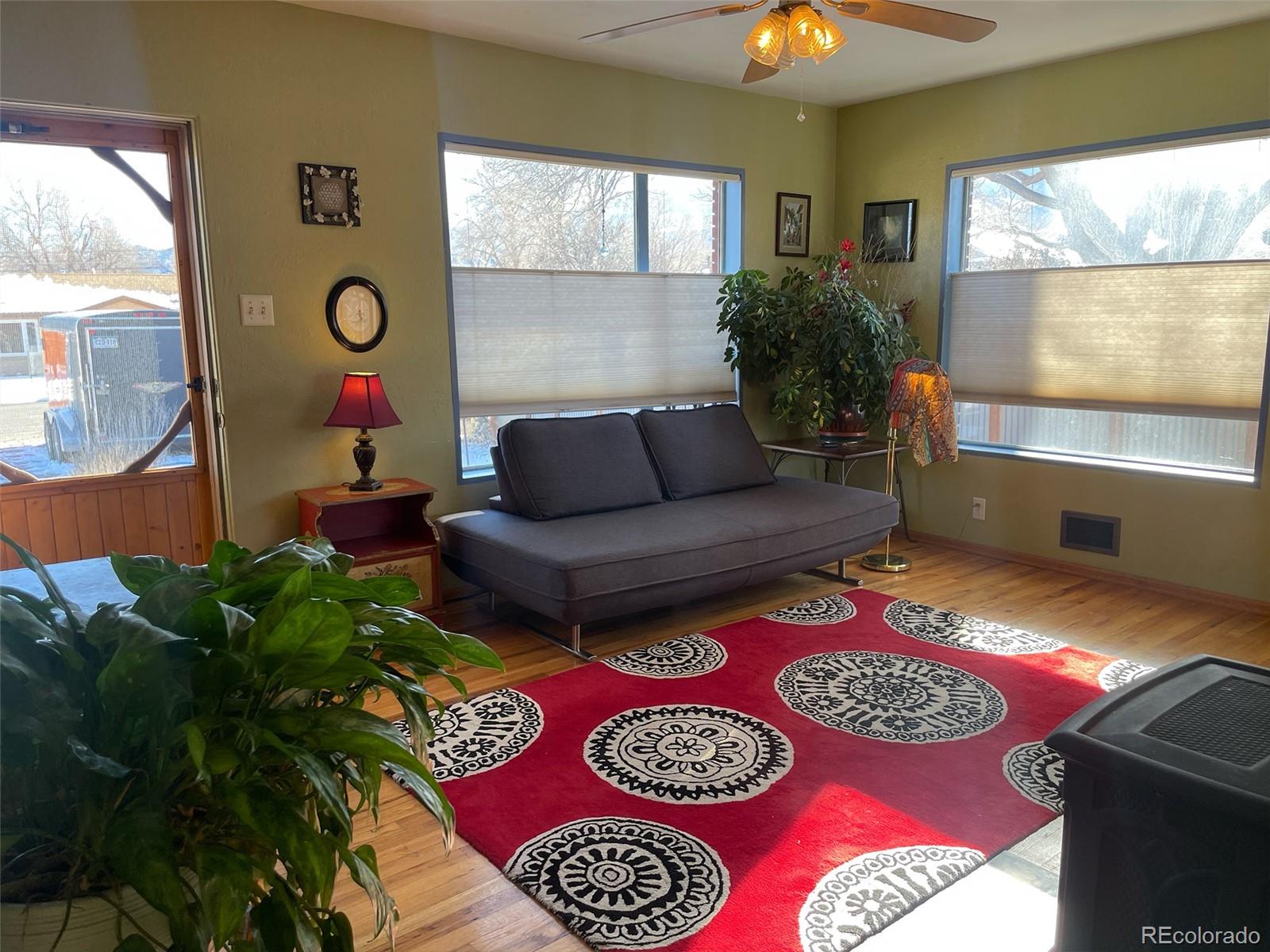 1328 I Street Salida, CO 81201 - Photo 6 of 24 a living room with furniture and a window