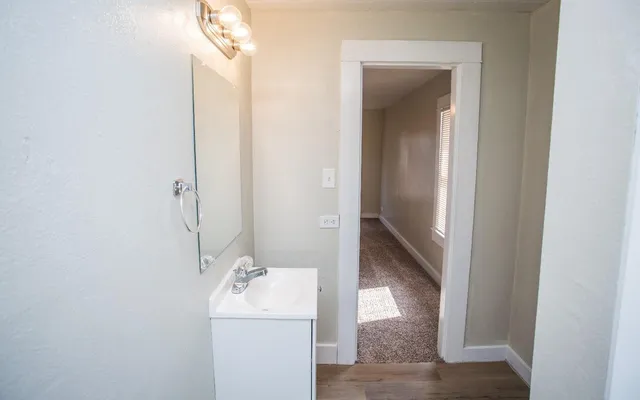 a view of an empty room with a window