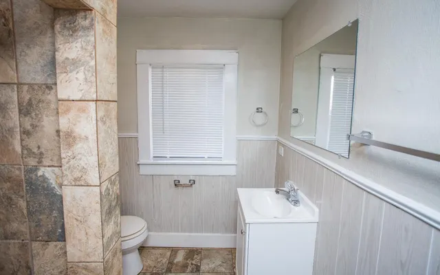 a bathroom with a toilet