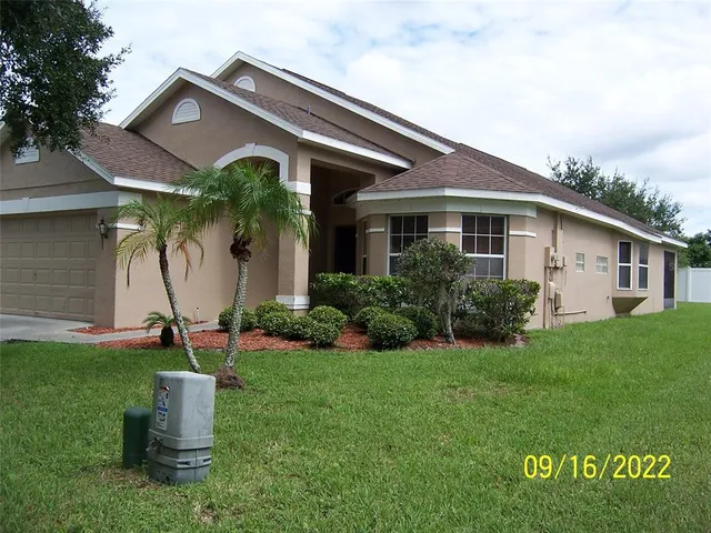 a house view with a garden space