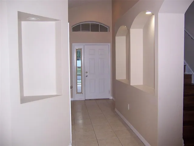 a view of a hallway with entryway