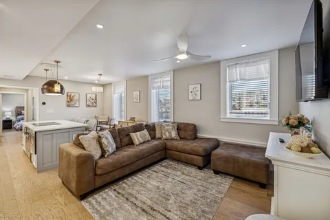 a living room with furniture and a window