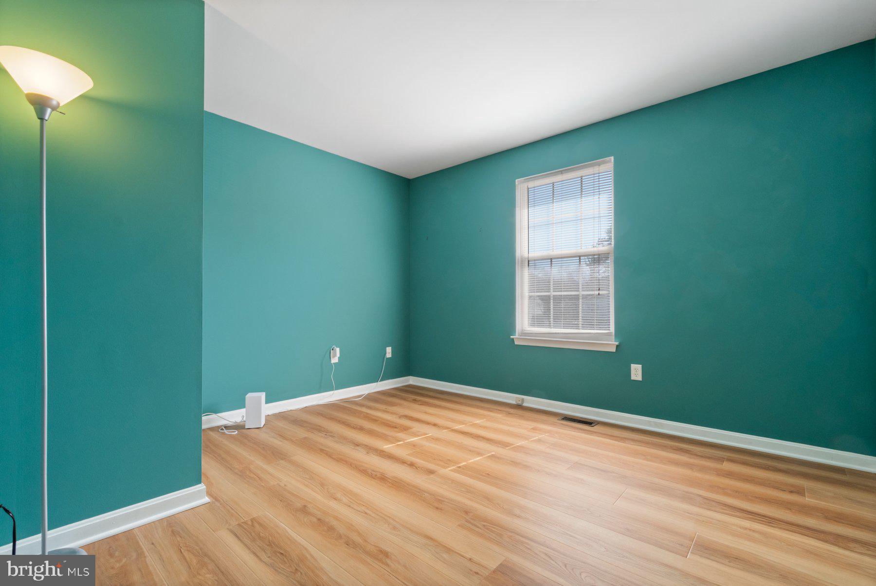 1512 Pullman Drive Severn, MD 21144 - Photo 17 of 34 a bedroom with a bed and a window