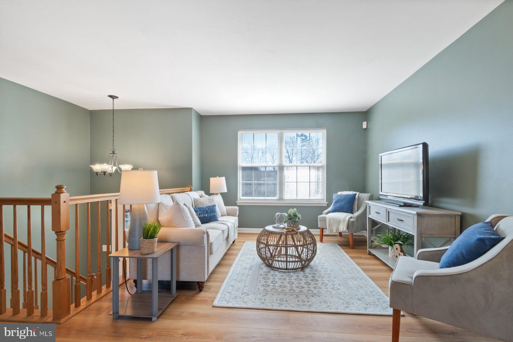 1512 Pullman Drive Severn, MD 21144 - Photo 2 of 34 a living room with furniture kitchen view and a window