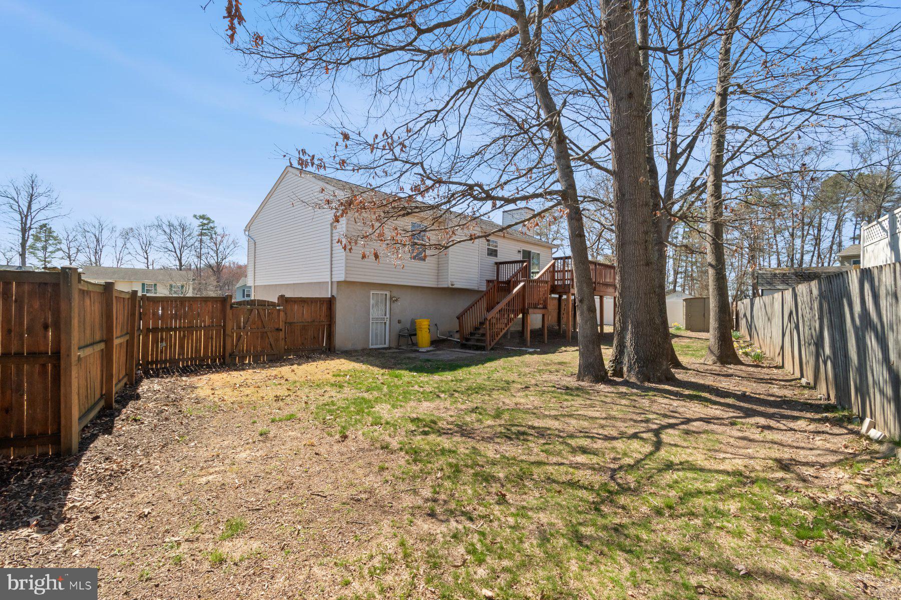 1512 Pullman Drive Severn, MD 21144 - Photo 26 of 34 a street view with wooden fence