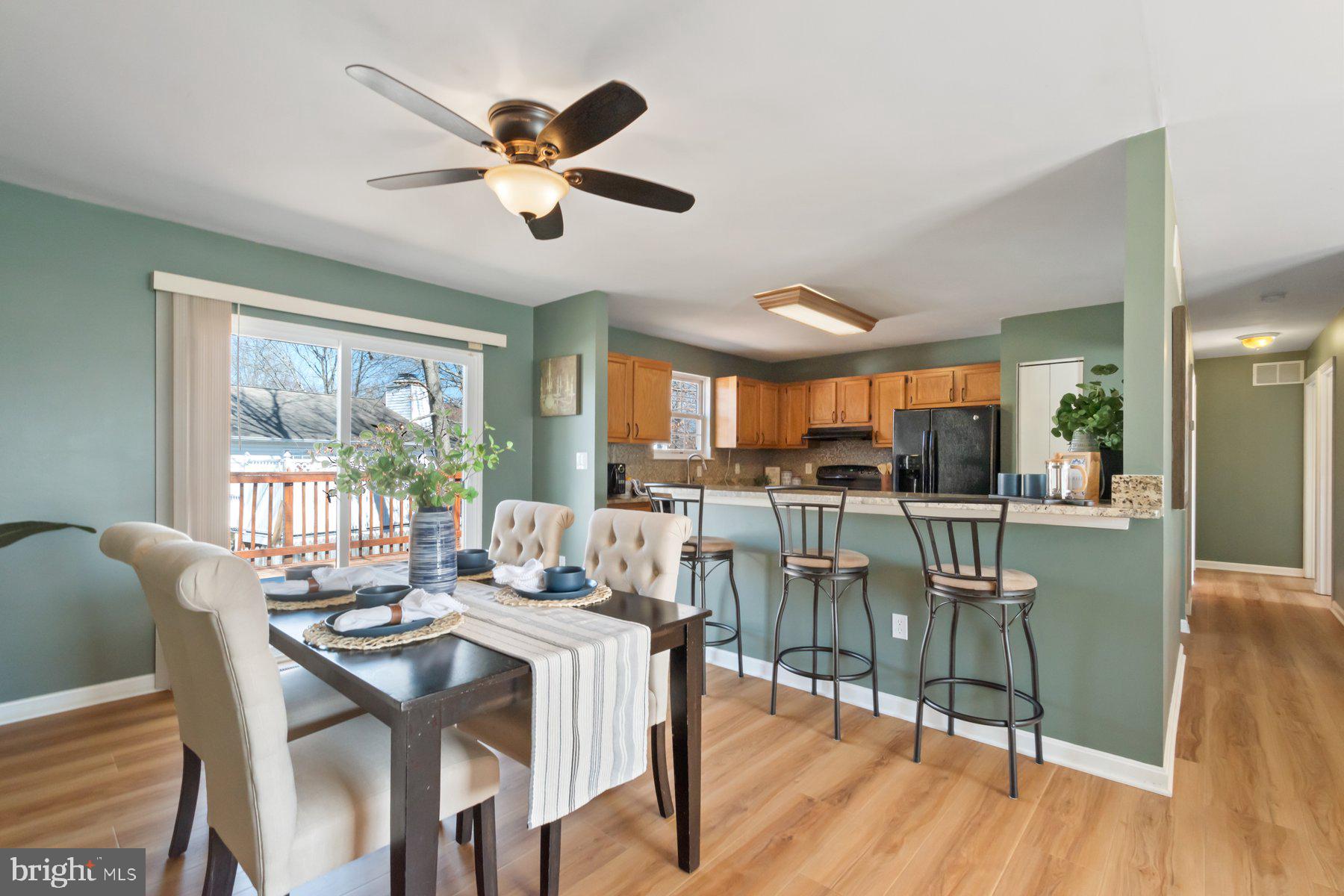 1512 Pullman Drive Severn, MD 21144 - Photo 5 of 34 a dining room with furniture window and wooden floor