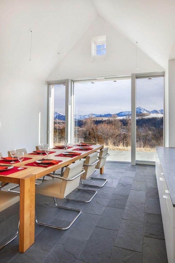 1068 Wilson Way Telluride, CO 81435 - Photo 12 of 40 a room with table chairs and window